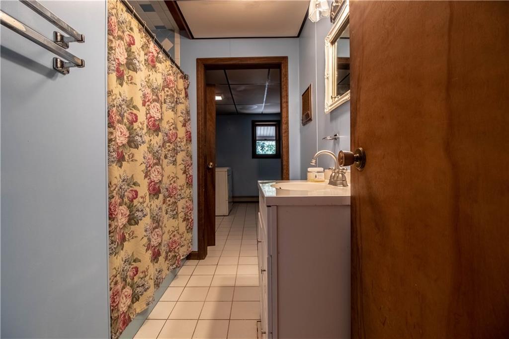 106 Robinson Hill Road Sebago, ME 04029 - Photo 21 of 34 Bathroom leading to laundry room