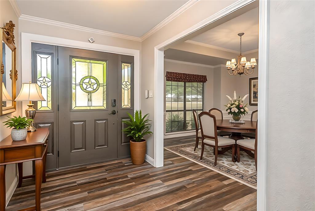 13 Crestview Circle Rockwall, TX 75087 - Photo 5 of 37 a view of a livingroom with furniture and a porch