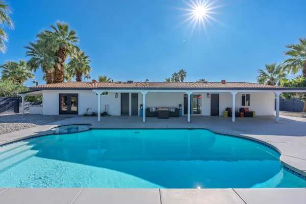 front view of a house with a patio