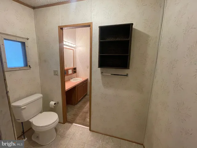 a bathroom with a toilet