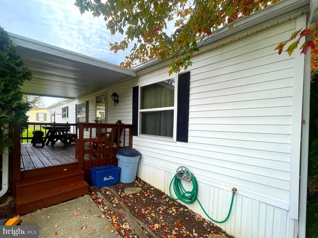 a view of a porch with seating space