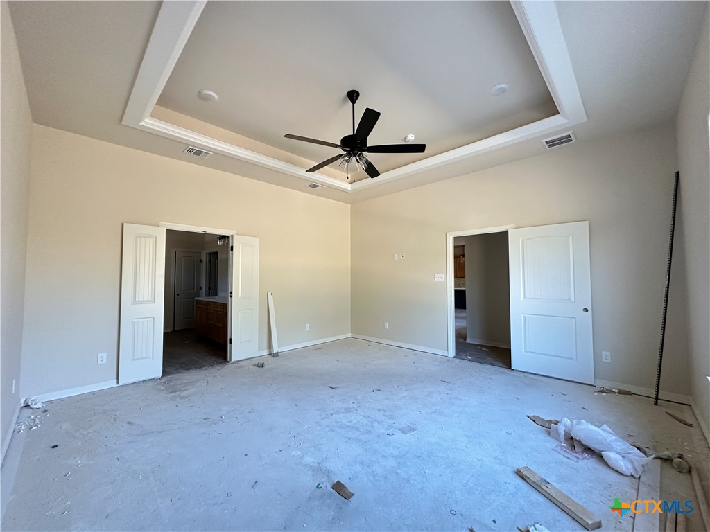 3502 Prato Lane Temple, TX 76502 - Photo 20 of 32 an empty room with closet and a ceiling fan