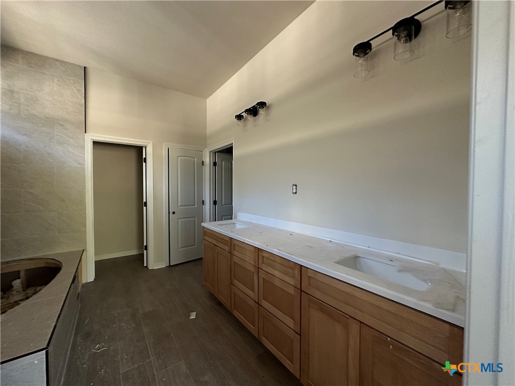 3502 Prato Lane Temple, TX 76502 - Photo 21 of 32 a bathroom with a sink and mirror