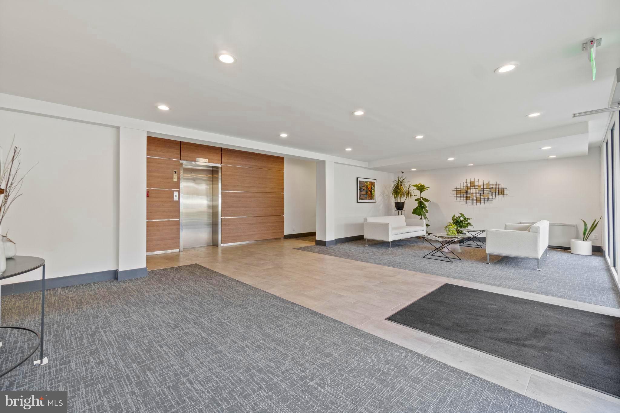 2710 Macomb Street Northwest, Unit 302 Washington, DC 20008 - Photo 2 of 19 Updated and welcoming lobby