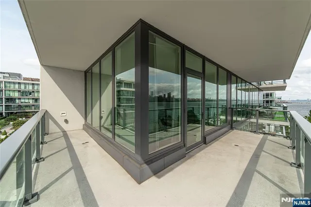 a balcony with water view