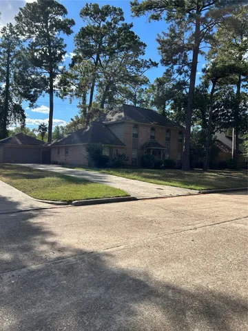 a view of a swimming pool with an outdoor space