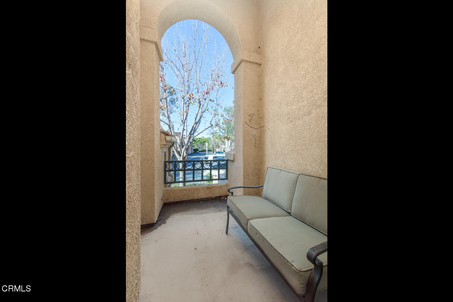 751 Kingfisher Way Oxnard, CA 93030 - Photo 11 of 22 a living room with furniture and a gate