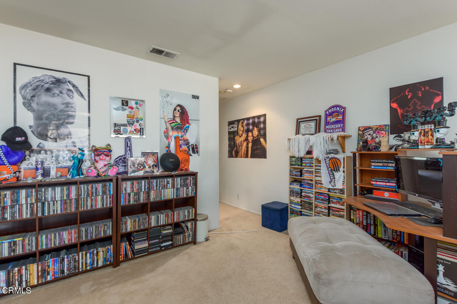 751 Kingfisher Way Oxnard, CA 93030 - Photo 12 of 22 a living room with lots of furniture and baby toys