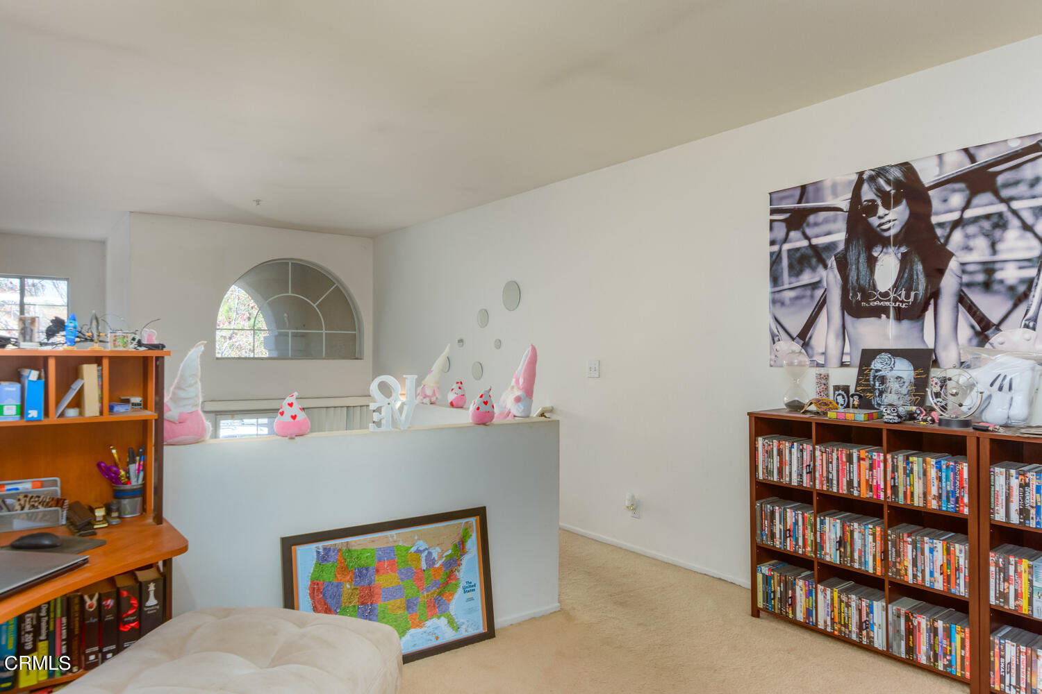 751 Kingfisher Way Oxnard, CA 93030 - Photo 13 of 22 a living room with lots of furniture and baby bed