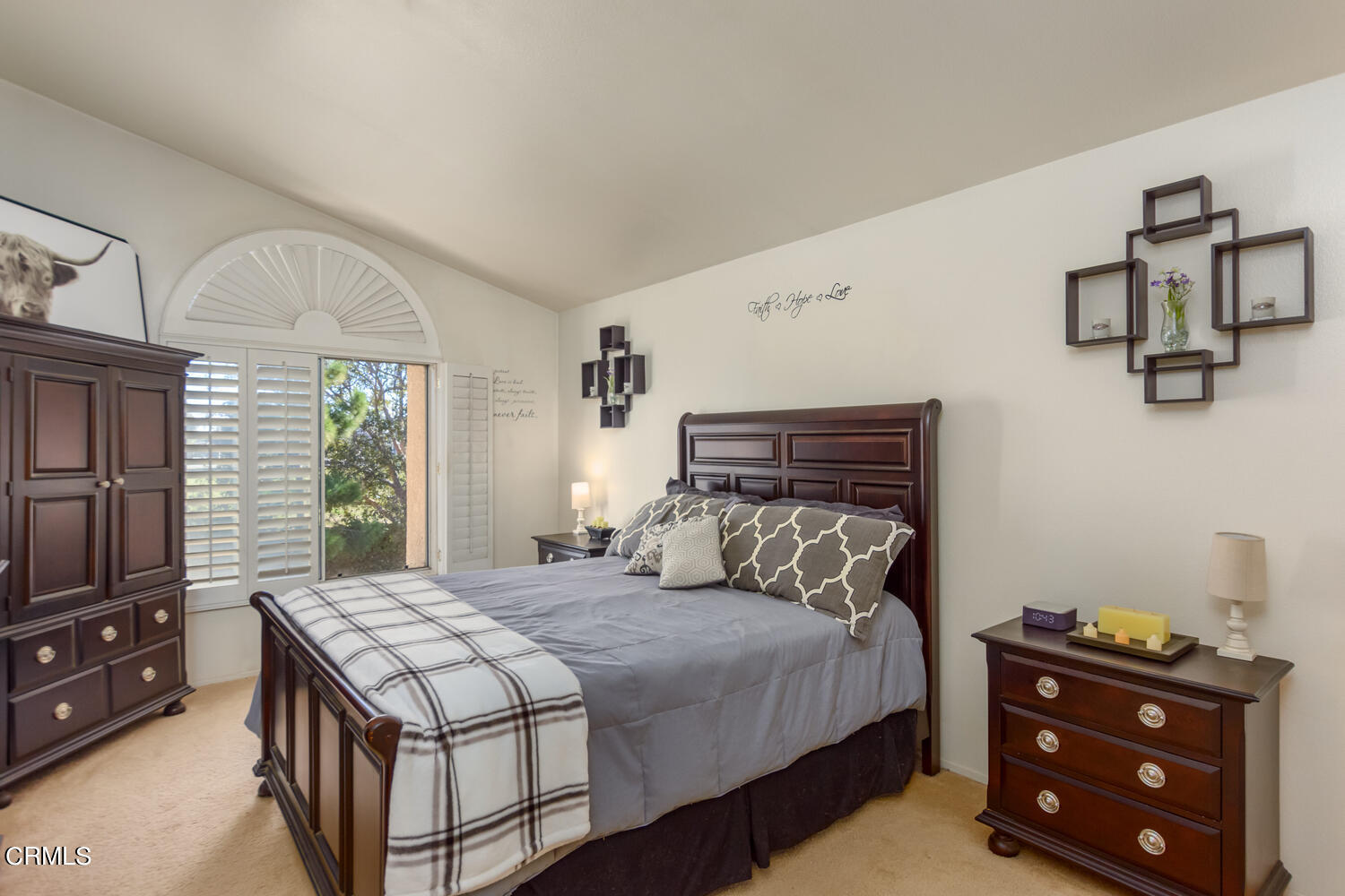 751 Kingfisher Way Oxnard, CA 93030 - Photo 14 of 22 a bedroom with a bed and wooden floor