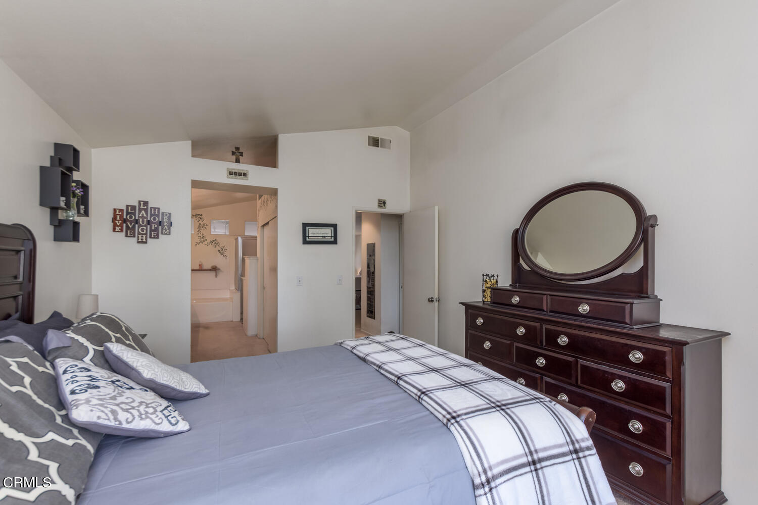 751 Kingfisher Way Oxnard, CA 93030 - Photo 15 of 22 a bedroom with a bed and a dresser