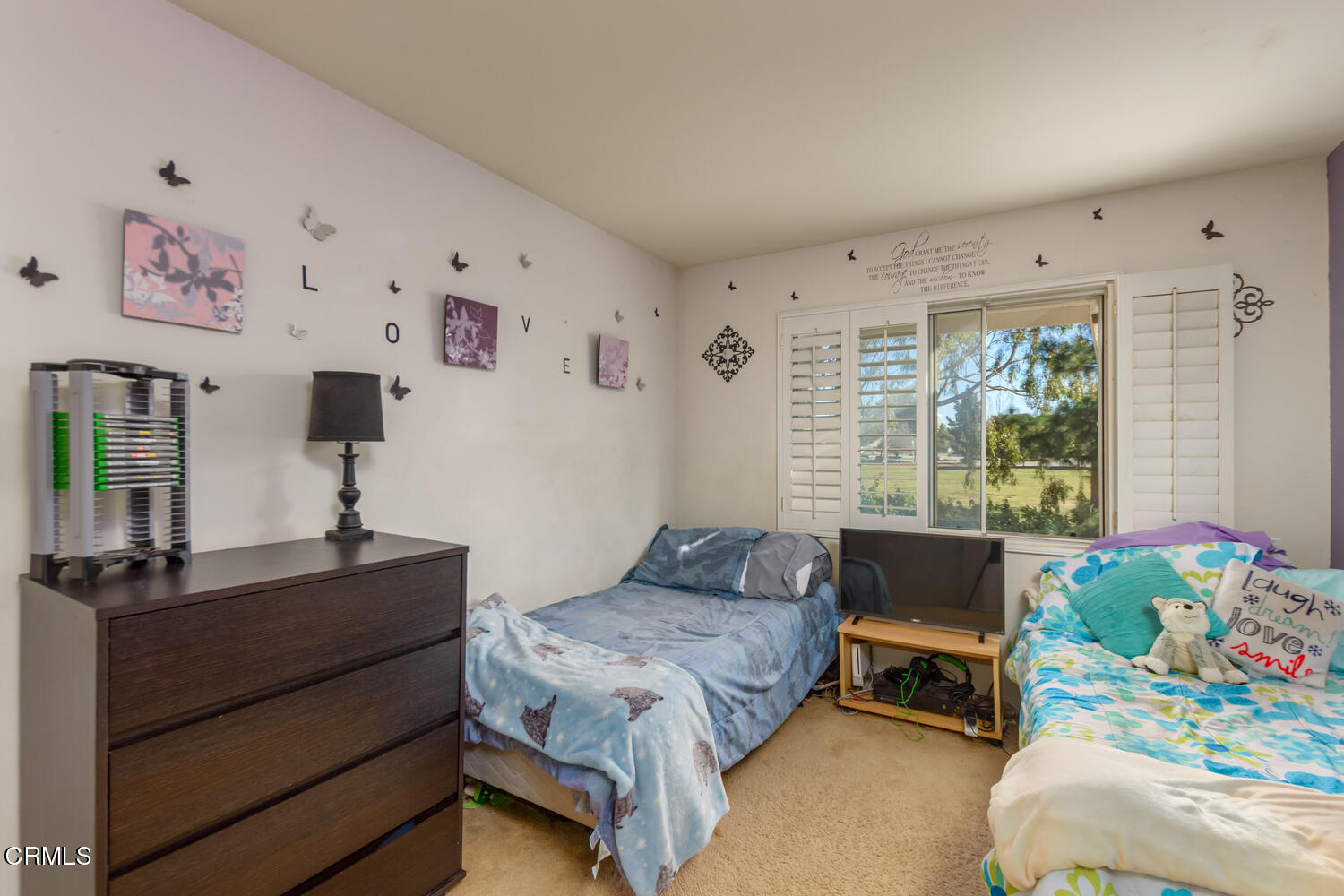 751 Kingfisher Way Oxnard, CA 93030 - Photo 17 of 22 a bedroom with a bed and a window
