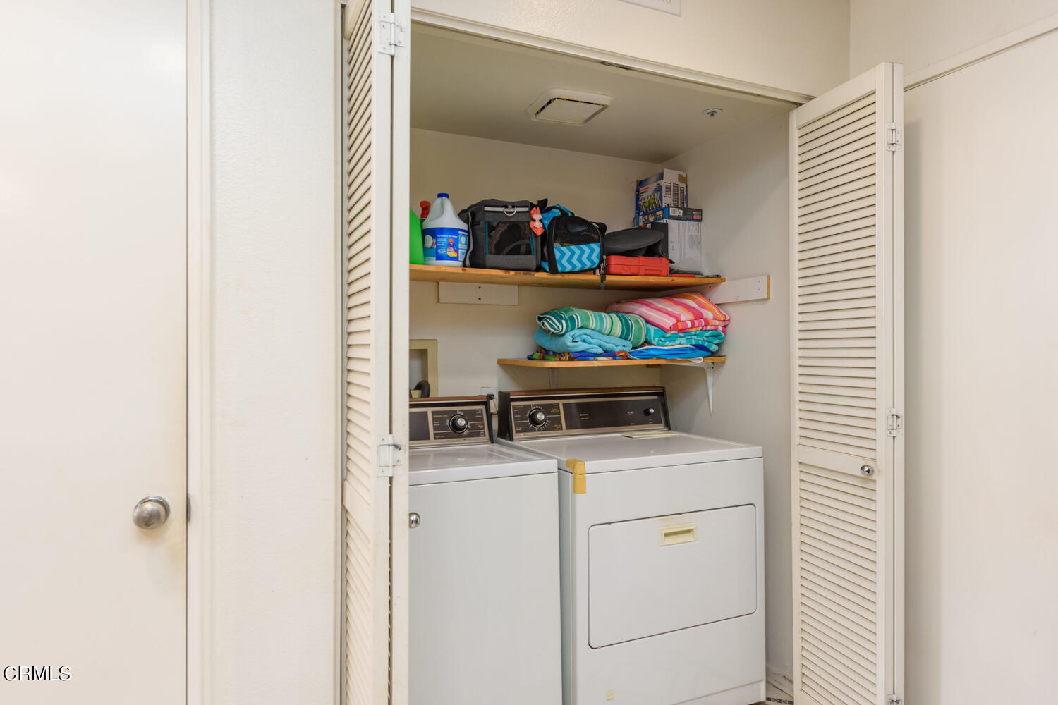 751 Kingfisher Way Oxnard, CA 93030 - Photo 19 of 22 a utility room with dryer and washer