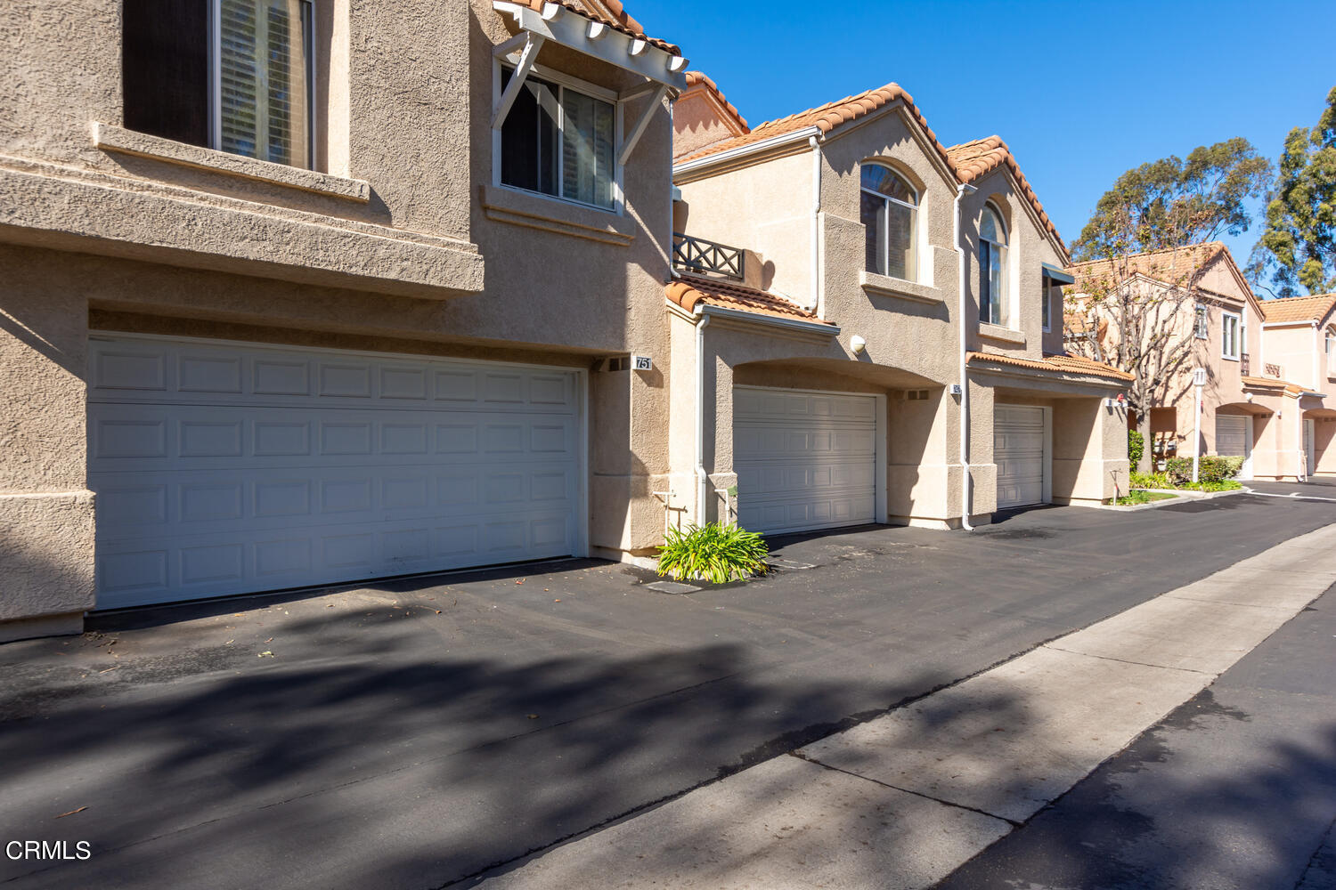 751 Kingfisher Way Oxnard, CA 93030 - Photo 20 of 22 a view of a house with many windows