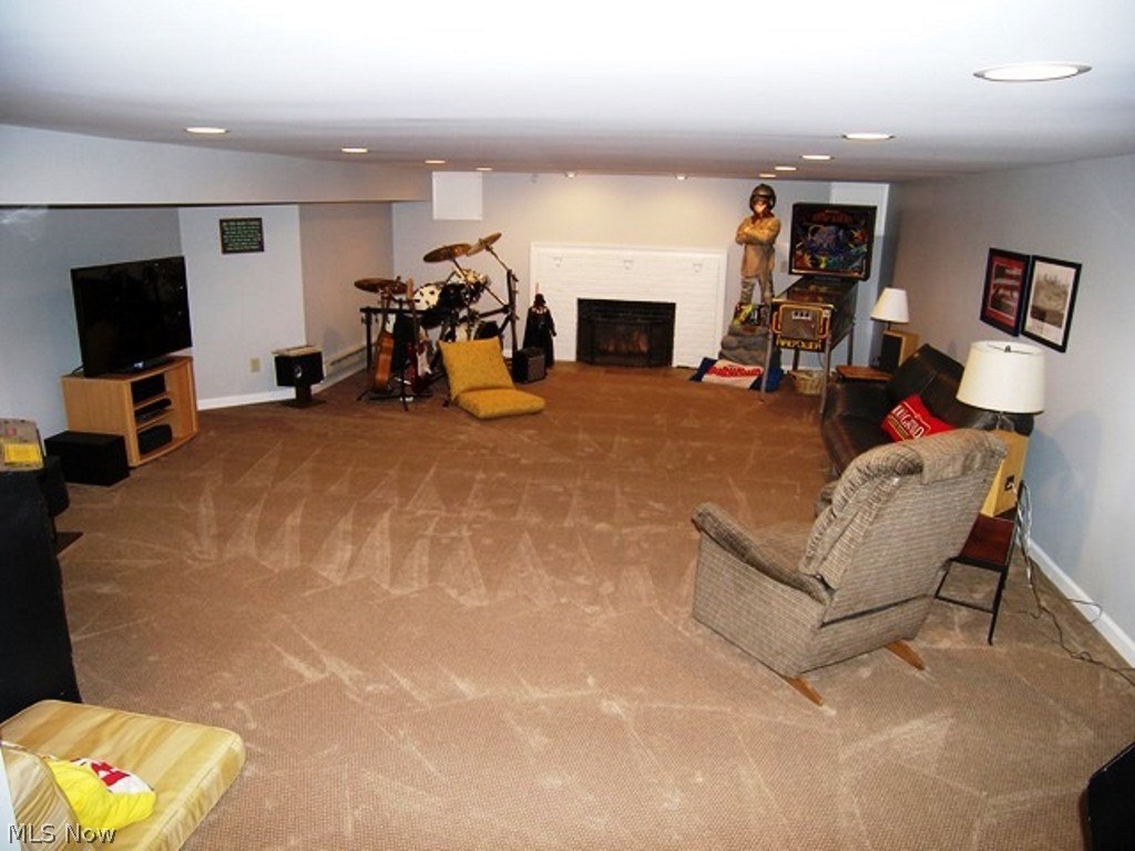 2914 Attleboro Road Cleveland, OH 44120 - Photo 24 of 28 Finished lower level rec room with woodburning fireplace, half bath and plenty of storage