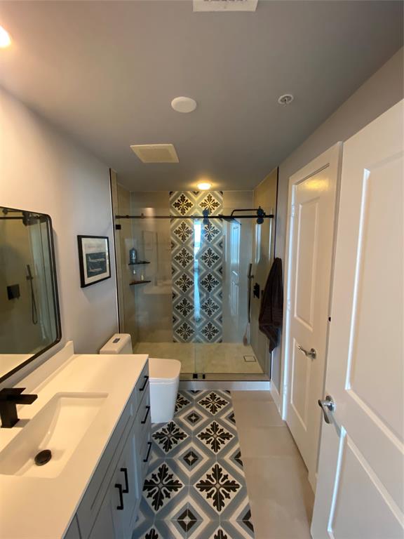 315 Northeast 3rd Avenue, Unit 1509 Fort Lauderdale, FL 33301 - Photo 12 of 40 a bathroom with a sink and a mirror