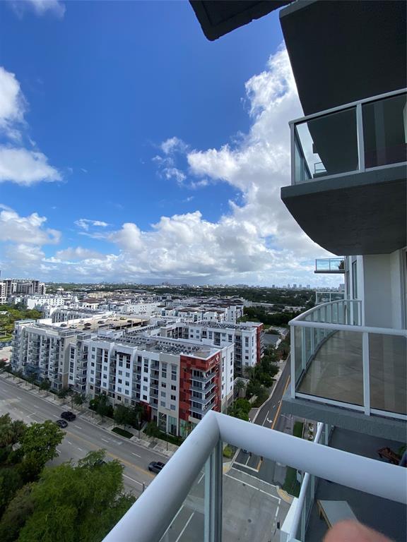 315 Northeast 3rd Avenue, Unit 1509 Fort Lauderdale, FL 33301 - Photo 17 of 40 a view of a balcony with an outdoor seating