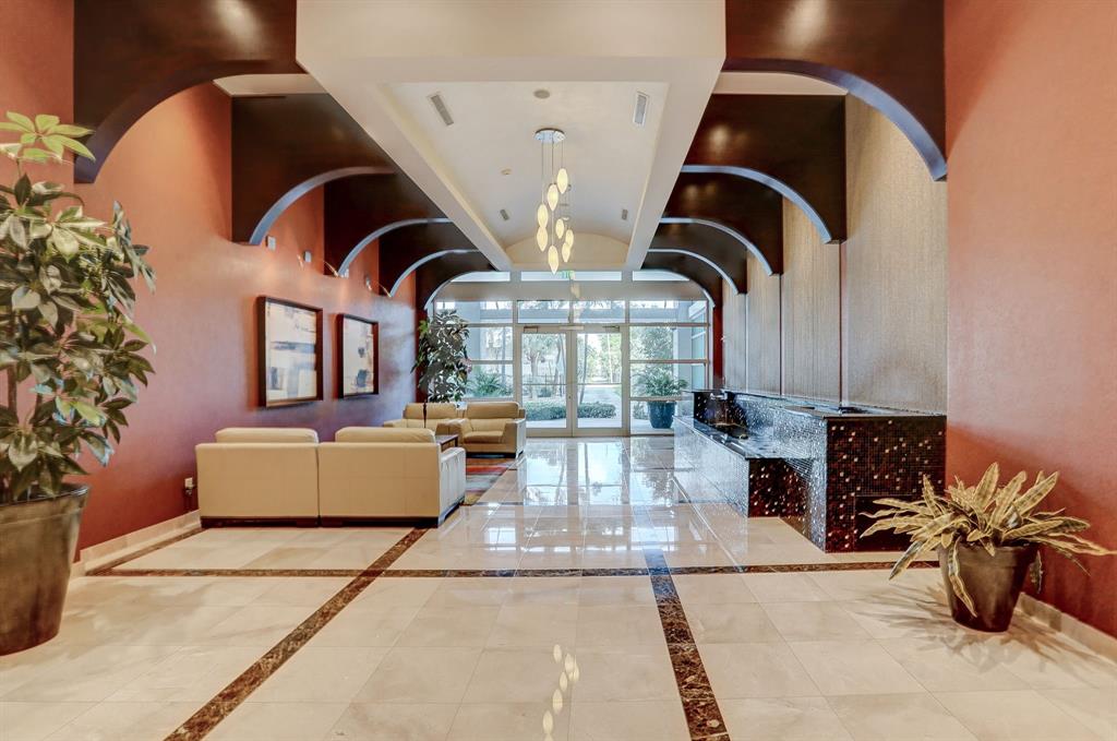 315 Northeast 3rd Avenue, Unit 1509 Fort Lauderdale, FL 33301 - Photo 23 of 40 a front view of a building with lobby