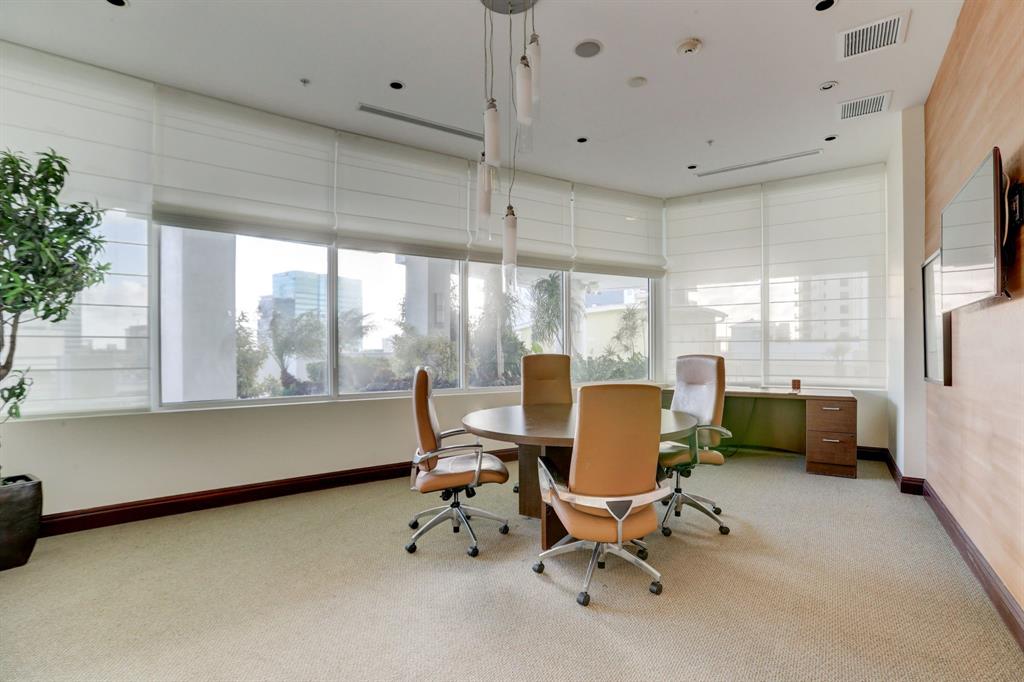 315 Northeast 3rd Avenue, Unit 1509 Fort Lauderdale, FL 33301 - Photo 33 of 40 a view of a workspace with furniture and a window