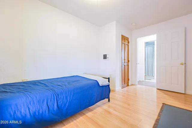 a bathroom with a sink toilet and a window