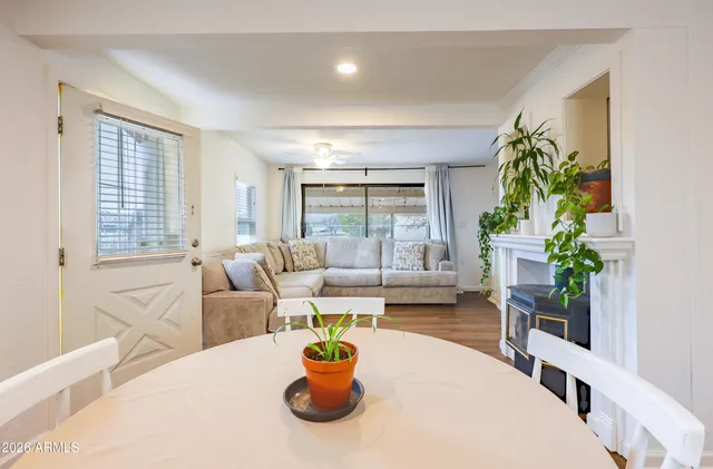 a bedroom with bed and window