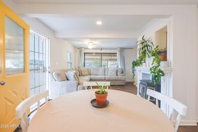 a kitchen with a white stove top oven and refrigerator