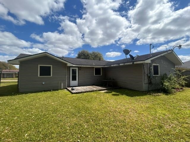 4420 Raven Street Beaumont, TX 77705 - Photo 2 of 11 a view of a house with a yard