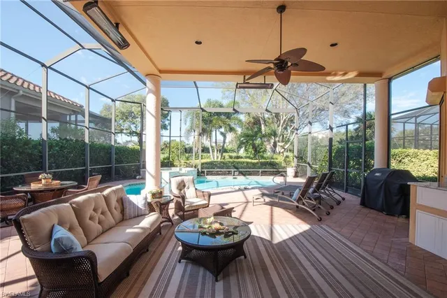 a view of a patio with couches chairs dining table and chairs
