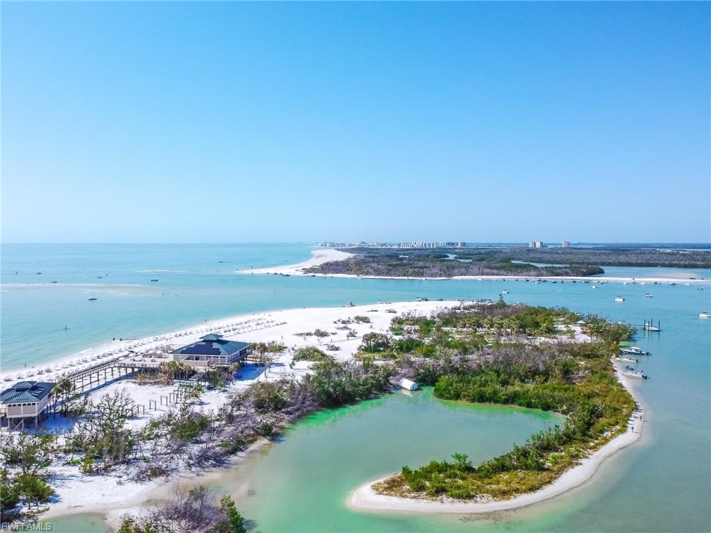 23841 Addison Pl Court Bonita Springs, FL 34134 - Photo 42 of 47 an aerial view of ocean and residential houses with outdoor space