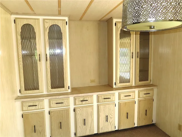 a view of a hallway with a window