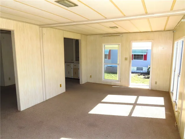 a view of a room with a large window