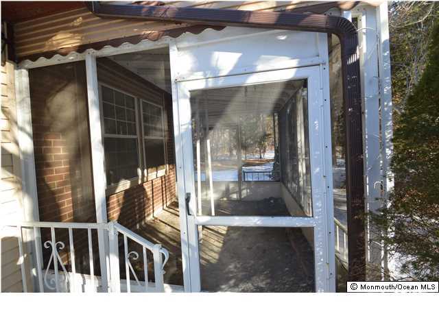 155D Sunset Road, Unit C Whiting, NJ 08759 - Photo 11 of 11 a view of living room and front door