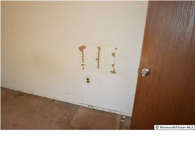 155D Sunset Road, Unit C Whiting, NJ 08759 - Photo 7 of 11 a black and white photo of a small space