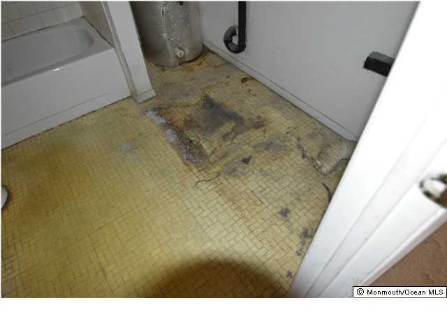 155D Sunset Road, Unit C Whiting, NJ 08759 - Photo 9 of 11 a picture of a bathroom with a sink