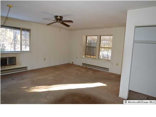 155D Sunset Road, Unit C Whiting, NJ 08759 - Photo 10 of 11 a view of empty room with windows