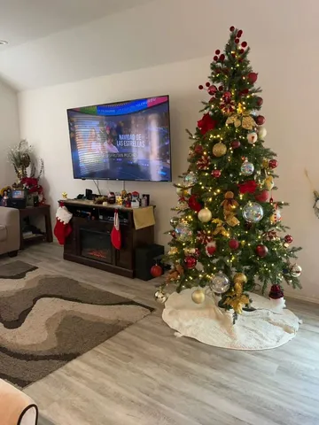 a view of a entryway door with wooden floor