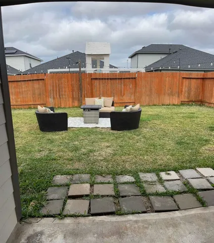a view of swimming pool outdoor seating