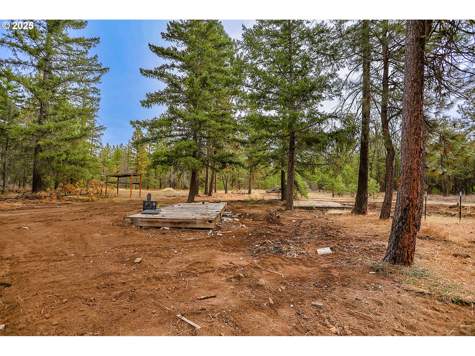 68 Matola Road Goldendale, WA 98620 - Photo 12 of 36 a backyard of a house with lots of green space
