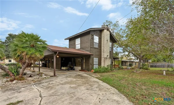 a house view with a outdoor space