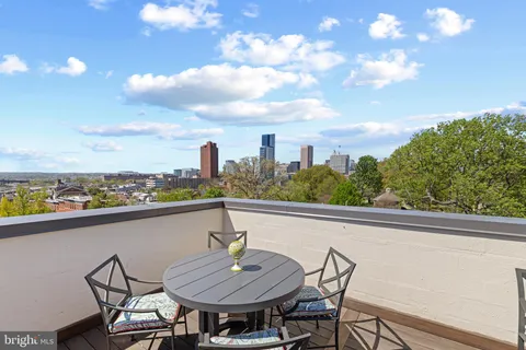 a view of a city with tall buildings