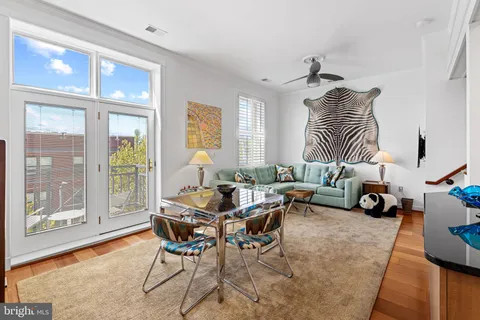 a view of a balcony with furniture