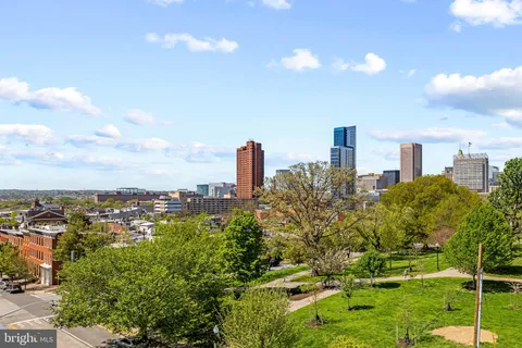 a view of a building with a street