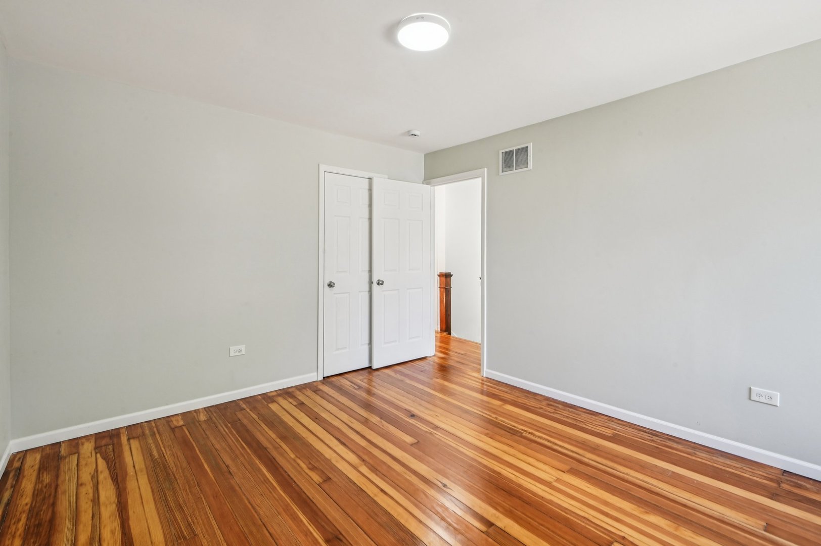 608 Whitley Avenue Joliet, IL 60433 - Photo 24 of 38 a view of room with wooden floor