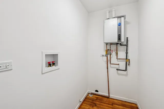 a room with a door and mirror