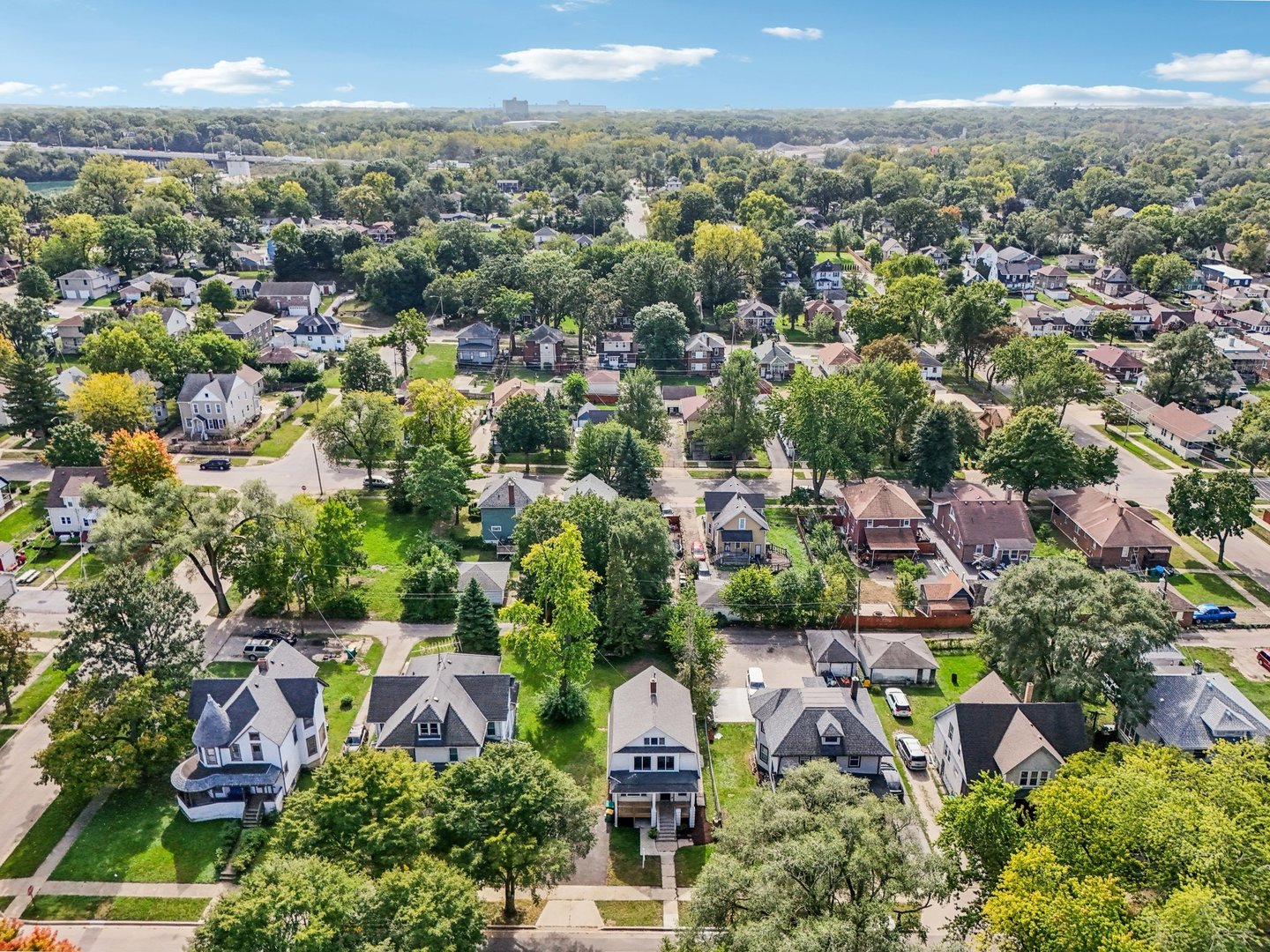 608 Whitley Avenue Joliet, IL 60433 - Photo 32 of 38 an aerial view of residential houses with outdoor space and trees