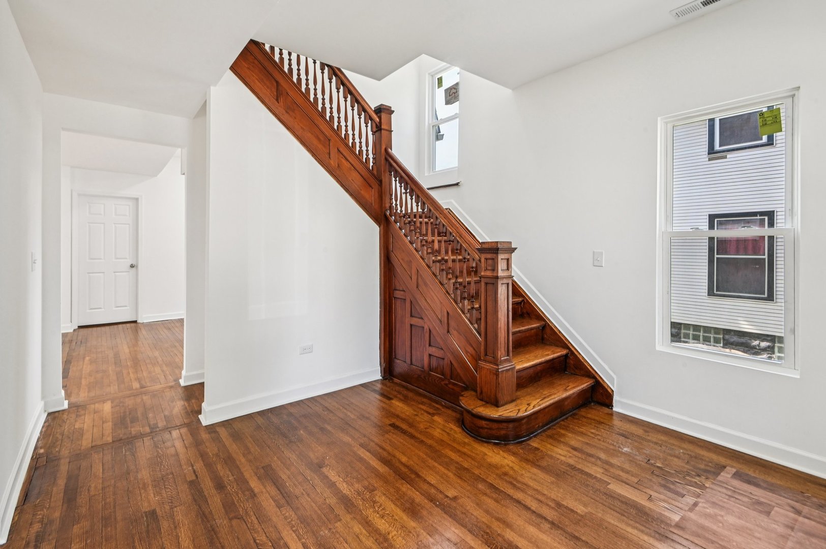 608 Whitley Avenue Joliet, IL 60433 - Photo 6 of 38 a view of an entryway with wooden floor