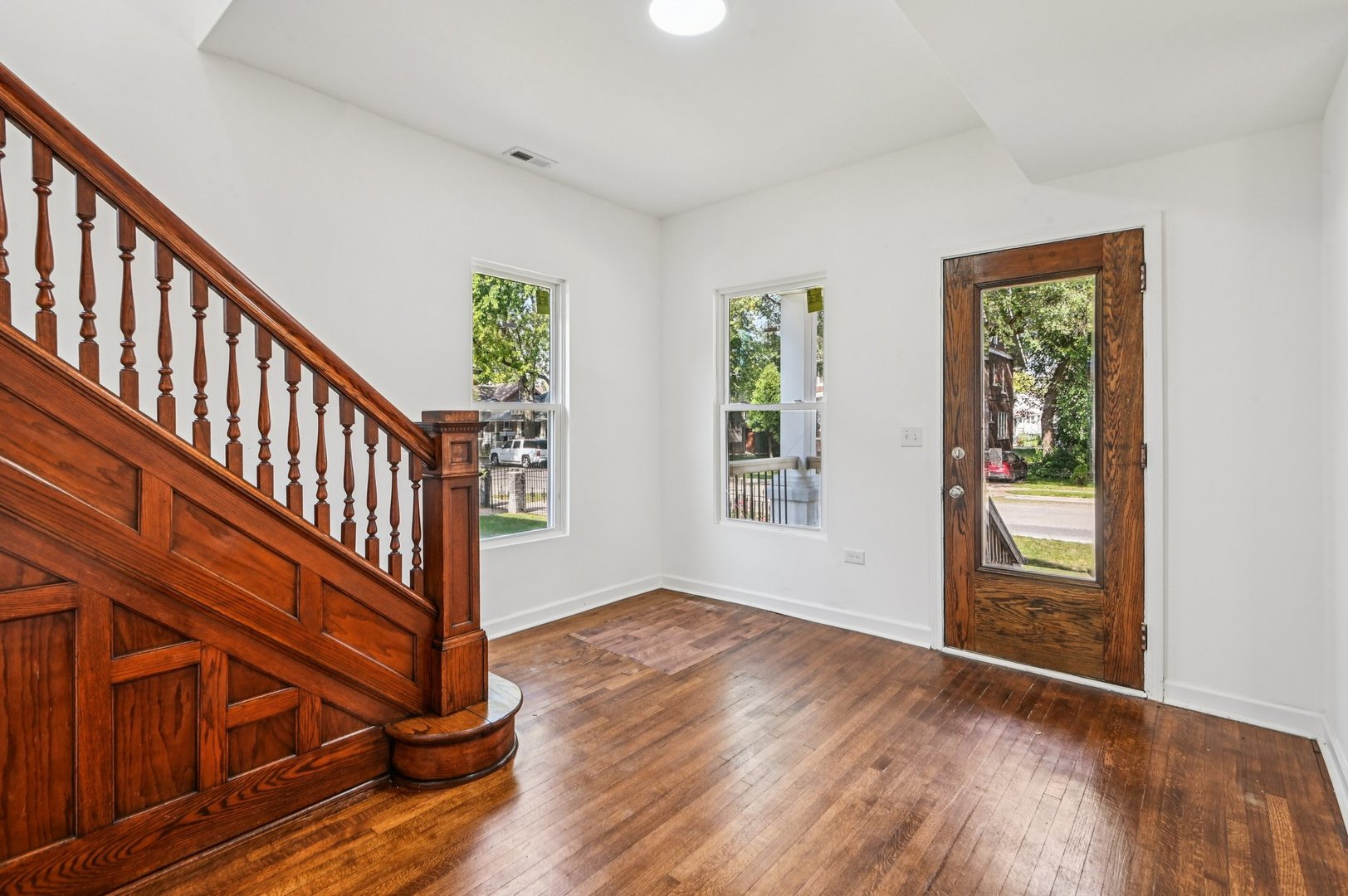 608 Whitley Avenue Joliet, IL 60433 - Photo 7 of 38 a view of an entryway with wooden floor
