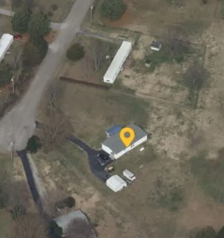a view of porch with wooden floor