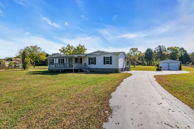 a view of a house with a swimming pool