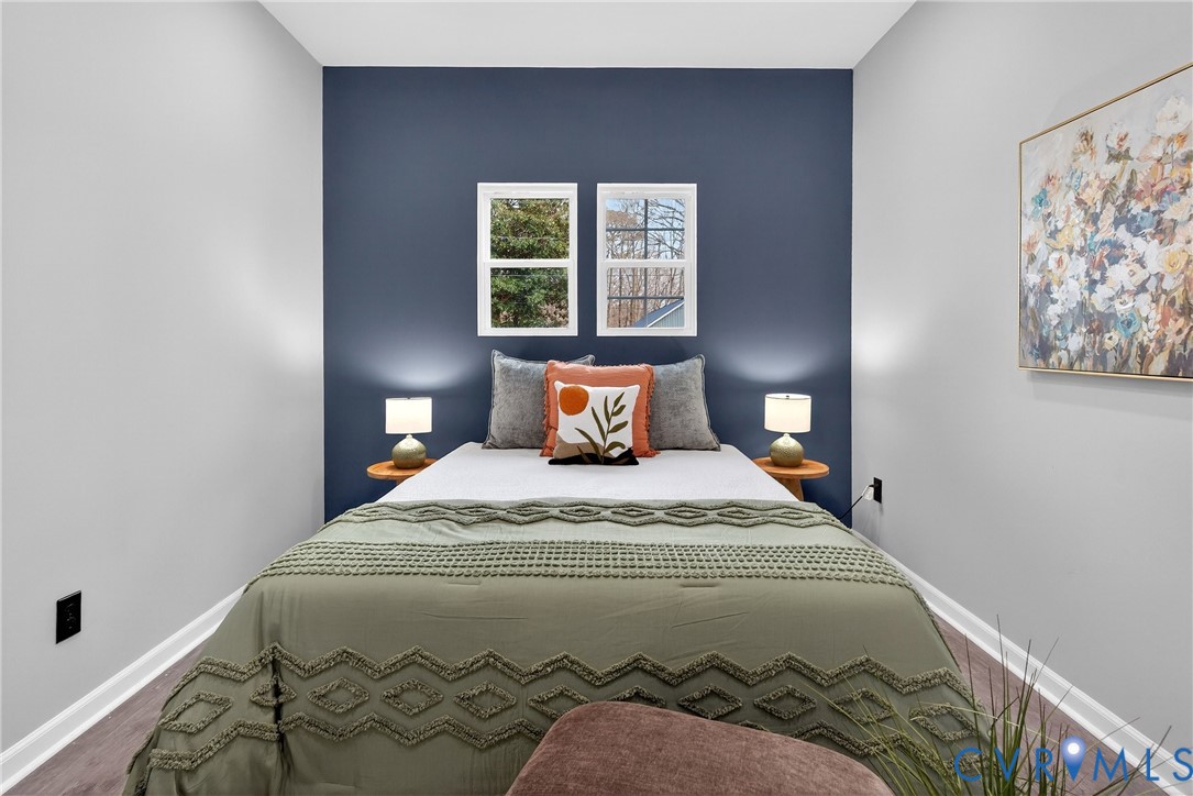 1952 Powell Road Richmond, VA 23224 - Photo 15 of 36 a bedroom with a bed and window